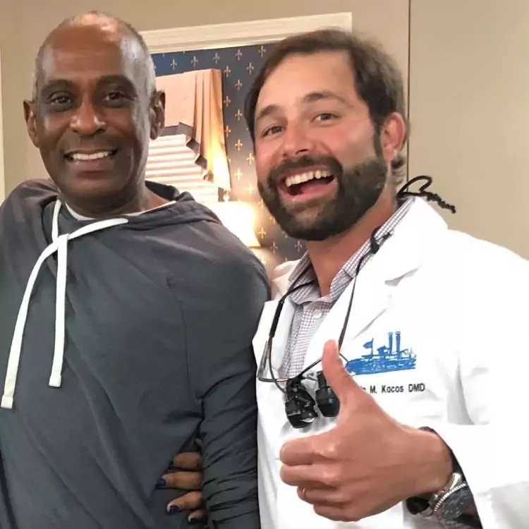 Dr. Kacos posing with another smile makeover patient